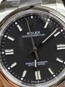 Rolex-Oyster-Perpetual-126000-Black-Dial-768x1024